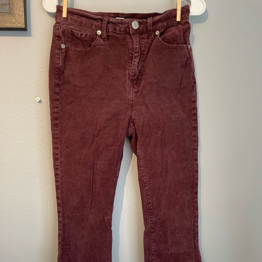 BDG maroon corduroy flare pants.